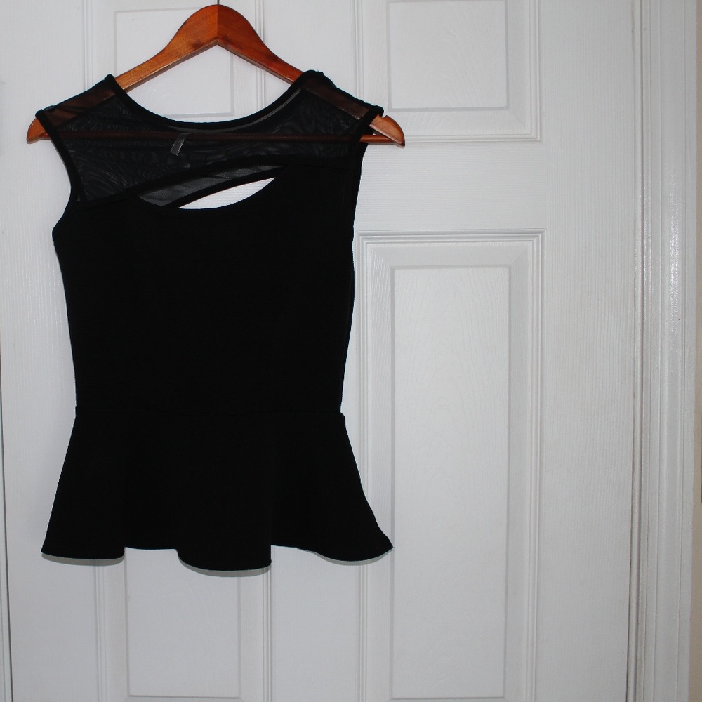 Black sleeveless peplum top